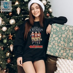 Official San Francisco 49Ers Never Underestimate A Woman Who Understands Football And Loves Mccaffrey Purdy And Kittle Signatures Shirt Hoodie hotcouturetrends 1 3